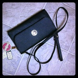 Cute small classy handbag by sasha inc newyork